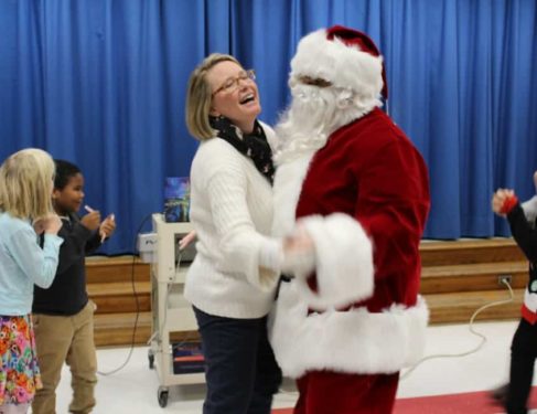 teacher dancing with santa