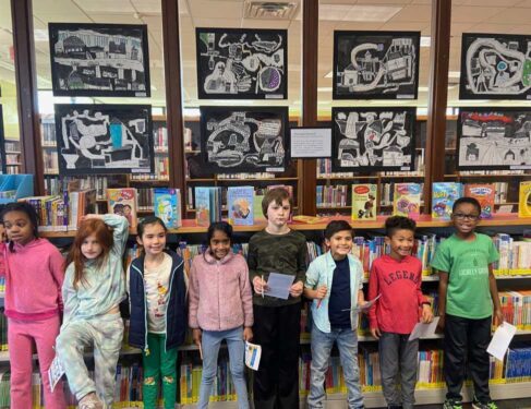 Students in front of Library Art Display